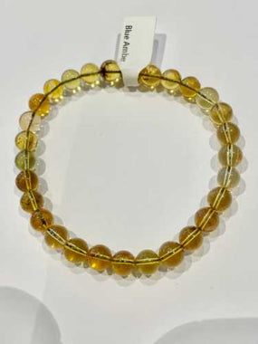 Blue Amber Bracelet - Round 6.5mm | Embrace Rare Elegance and Calming Energies - Ai NeDefault Category